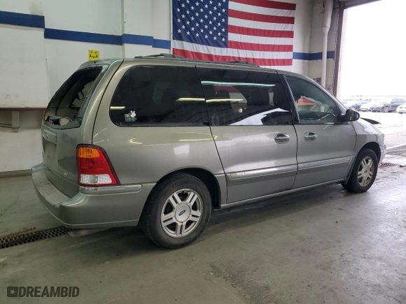 2003 Ford Windstar Wagon SE with VIN 2FMZA52403BB67426, listed as a Copart auction lot 77018904 with 0 mi miles and Salvage Title. Bid and sale history available at carsss.com. Image 3.