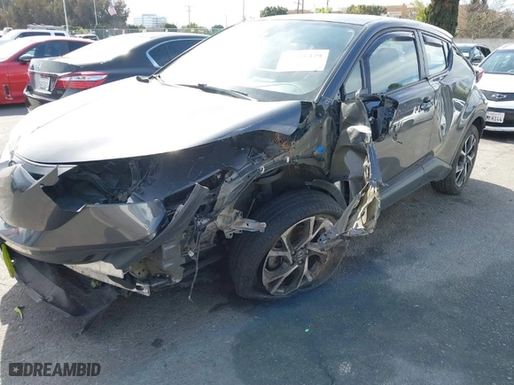 2019 Toyota C-HR XLE with VIN NMTKHMBX0KR082149, listed as a IAAI auction lot 41601379 with 79,765 mi miles. Bid and sale history available at carsss.com. Image 6.