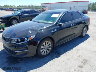 2017 Kia Optima EX with VIN 5XXGU4L35HG142807, listed as a IAAI auction lot 41856251 with 104,634 mi miles. Bid and sale history available at carsss.com. Image 19.