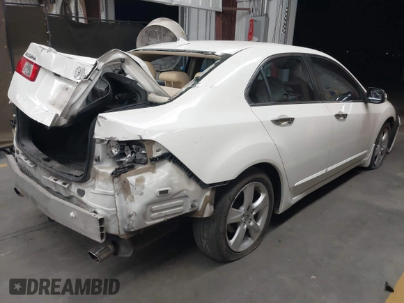 2009 Acura TSX with VIN JH4CU26669C028582, listed as a IAAI auction lot 42074708 with 194,316 mi miles. Bid and sale history available at carsss.com. Image 4.
