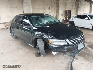 2015 Volkswagen Passat 1.8T S with VIN 1VWAT7A32FC097218, listed as a IAAI auction lot 40044668 with 165,756 mi miles. Bid and sale history available at carsss.com. Image 1.