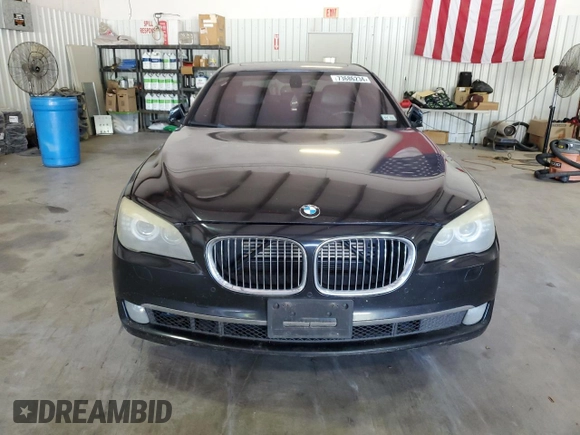 2011 BMW 7 Series with VIN WBAKX6C50BC197118, listed as a Copart auction lot 73686234 with 166,393 mi miles and Clean title. Bid and sale history available at DreamBid. Image 5.