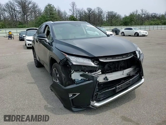 2017 Lexus RX 350 z VIN 2T2BZMCA1HC131638, wystawiony jako Copart lot #60157135 z przebiegiem 252 807 mil mil oraz Szkoda całkowita • Salvage title. Historia ofert i sprzedaży dostępna na DreamBid. Obrazek 14.