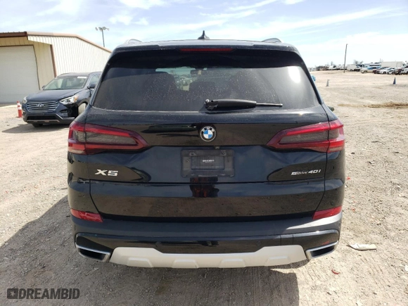 2021 BMW X5 sDrive40i with VIN 5UXCR4C05M9G60740, listed as a Copart auction lot 47989915 with 0 mi miles and Salvage Title. Bid and sale history available at carsss.com. Image 6.