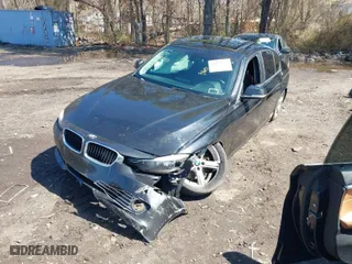 2014 BMW 3 Series 328i xDrive with VIN WBA3B5G59ENS09377, listed as a IAAI auction lot 41921377 with 102,160 mi miles. Bid and sale history available at carsss.com. Image 2.