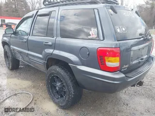 2003 Jeep Grand Cherokee Limited with VIN 1J4GW58N43C521617, listed as a IAAI auction lot 41781064 with 228,086 mi miles. Bid and sale history available at carsss.com. Image 3.