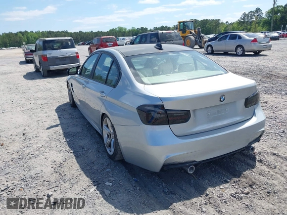 2013 BMW 3 Series 328i with VIN WBA3A5C57DF356069, listed as a IAAI auction lot 42078635 with 140,669 mi miles. Bid and sale history available at carsss.com. Image 3.
