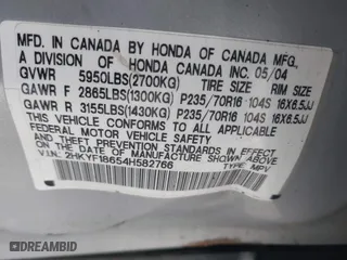 2004 Honda Pilot EX with VIN 2HKYF18654H582766, listed as a IAAI auction lot 41537873 with 294,035 mi miles. Bid and sale history available at carsss.com. Image 9.