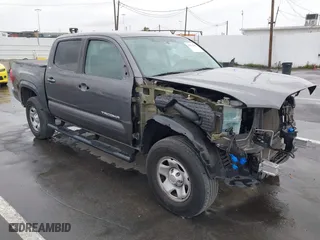 2017 Toyota Tacoma SR with VIN 5TFAX5GN7HX101604, listed as a IAAI auction lot 41793491 with 94,802 mi miles. Bid and sale history available at carsss.com. Image 1.