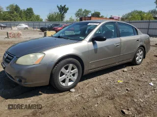 2002 Nissan Altima SL z VIN 1N4AL11D32C194629, wystawiony jako Copart lot #58358725 z przebiegiem 281 993 mil mil oraz Szkoda całkowita • Salvage title. Historia ofert i sprzedaży dostępna na DreamBid. Obrazek 1.
