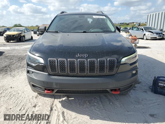 2019 Jeep Cherokee Trailhawk с VIN 1C4PJMBXXKD342371, выставлен на аукционе Copart как лот 55144715 с пробегом 78 433 миль миль и Списание • Salvage title. История ставок и продаж доступна на DreamBid. Изображение 5.