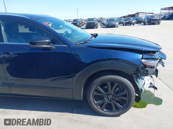 2021 Mazda CX-30 Premium with VIN 3MVDMBDYXMM307047, listed as a IAAI auction lot 41974966 with 53,409 mi miles and . Bid and sale history available at carsss.com. Image 18.