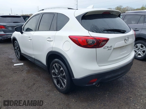 2016 Mazda CX-5 Grand Touring with VIN JM3KE4DY3G0838204, listed as a IAAI auction lot 41961049 with 98,918 mi miles and . Bid and sale history available at carsss.com. Image 3.