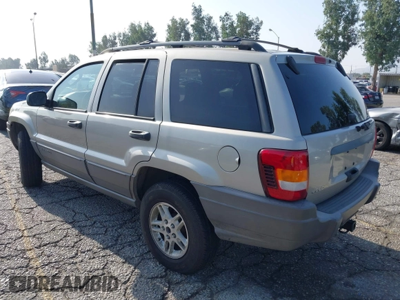 2004 Jeep Grand Cherokee Laredo with VIN 1J4GX48N24C334983, listed as a IAAI auction lot 42522088 with 169,793 mi miles and . Bid and sale history available at DreamBid. Image 3.