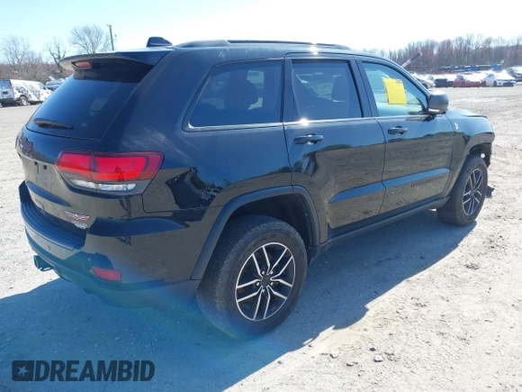 2021 Jeep Grand Cherokee Trailhawk with VIN 1C4RJFLGXMC698606, listed as a IAAI auction lot 41901479 with 50,086 mi miles. Bid and sale history available at carsss.com. Image 4.