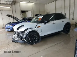 2017 MINI Hardtop 4 Door Cooper z VIN WMWXU1C31H2F77621, wystawiony jako Copart lot #56499435 z przebiegiem 79 302 mil mil oraz Szkoda całkowita • Salvage title. Historia ofert i sprzedaży dostępna na DreamBid. Obrazek 1.