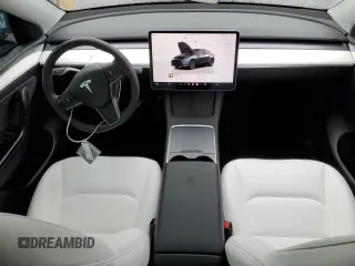 2025 Tesla Model Y Long Range with VIN 7SAYGAEE3SF216635, listed as a Copart auction lot 44614555 with 400 mi miles and Salvage Title. Bid and sale history available at DreamBid. Image 8.