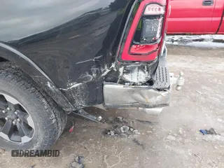 2019 Ram 1500 Laramie with VIN 1C6SRFDT6KN869740, listed as a IAAI auction lot 41563751 with 132,611 mi miles. Bid and sale history available at carsss.com. Image 6.