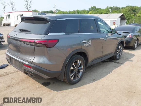 2023 Infiniti QX60 Luxe z VIN 5N1DL1FSXPC359769, wystawiony jako IAAI lot #42389617 z przebiegiem 32 281 mil mil oraz . Historia ofert i sprzedaży dostępna na DreamBid. Obrazek 4.