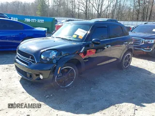 2015 MINI Countryman S with VIN WMWZC3C5XFWT04916, listed as a IAAI auction lot 41636369 with 101,448 mi miles and . Bid and sale history available at DreamBid. Image 18.