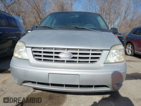 2004 Ford Freestar SE z VIN 2FMZA51634BB15552, wystawiony jako IAAI lot #41448164 z przebiegiem 240 212 mil mil oraz . Historia ofert i sprzedaży dostępna na DreamBid. Obrazek 6.