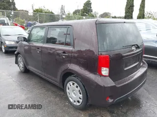 2015 Scion xB with VIN JTLZE4FE7FJ068936, listed as a IAAI auction lot 41565886 with 94,671 mi miles. Bid and sale history available at carsss.com. Image 3.
