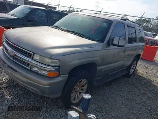 2001 Chevrolet Tahoe LS z VIN 1GNEC13T51R154488, wystawiony jako IAAI lot #41519004 z przebiegiem 400 208 mil mil oraz . Historia ofert i sprzedaży dostępna na DreamBid. Obrazek 2.