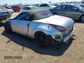 2006 Nissan 350Z Touring z VIN JN1AZ36A46M455174, wystawiony jako IAAI lot #42336110 z przebiegiem 101 251 mil mil oraz . Historia ofert i sprzedaży dostępna na DreamBid. Obrazek 3.