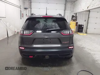 2022 Jeep Cherokee Trailhawk z VIN 1C4PJMBX9ND514703, wystawiony jako IAAI lot #41761037 z przebiegiem 38 499 mil mil oraz . Historia ofert i sprzedaży dostępna na DreamBid. Obrazek 16.