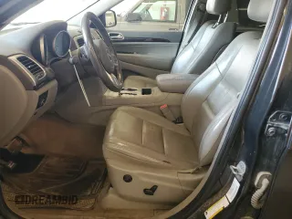 2011 Jeep Grand Cherokee Laredo with VIN 1J4RR4GG6BC641138, listed as a Copart auction lot 60209955 with 218,235 mi miles and Clean title. Bid and sale history available at DreamBid. Image 7.
