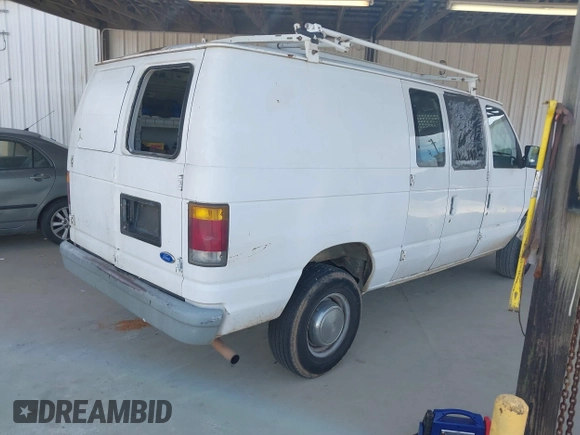1993 Ford Econoline Cargo with VIN 1FTJE34H2PHA67802, listed as a IAAI auction lot 41909401 with Not Provided miles and . Bid and sale history available at DreamBid. Image 4.