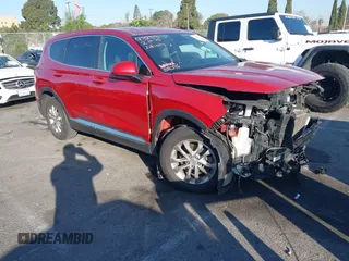 2019 Hyundai Santa Fe SE z VIN 5NMS23AD0KH073670, wystawiony jako IAAI lot #41578398 z przebiegiem 154 716 mil mil oraz . Historia ofert i sprzedaży dostępna na DreamBid. Obrazek 1.