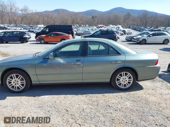 2003 Lincoln LS Sport with VIN 1LNHM87A33Y677386, listed as a IAAI auction lot 41890308 with 139,498 mi miles. Bid and sale history available at carsss.com. Image 14.