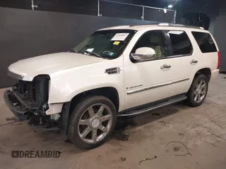 2007 Cadillac Escalade z VIN 1GYFK63837R238451, wystawiony jako IAAI lot #42368857 z przebiegiem 182 030 mil mil oraz . Historia ofert i sprzedaży dostępna na DreamBid. Obrazek 2.