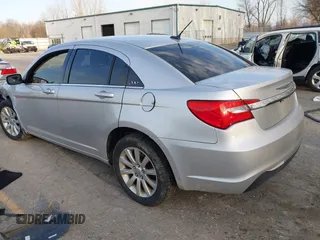 2012 Chrysler 200 Touring with VIN 1C3CCBBB8CN210825, listed as a IAAI auction lot 41828224 with 129,966 mi miles. Bid and sale history available at carsss.com. Image 3.