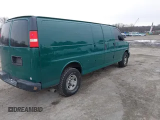 2014 Chevrolet Express Cargo Van with VIN 1GCWGGCAXE1198199, listed as a IAAI auction lot 41242821 with 274,446 mi miles. Bid and sale history available at carsss.com. Image 4.