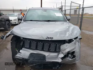 2020 Jeep Grand Cherokee Altitude with VIN 1C4RJEAG2LC392060, listed as a IAAI auction lot 40765662 with 30,505 mi miles and . Bid and sale history available at DreamBid. Image 13.