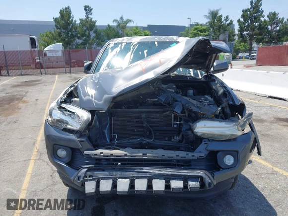 2017 Toyota Tacoma SR5 z VIN 3TMAZ5CN0HM039730, wystawiony jako IAAI lot #42406448 z przebiegiem 69 530 mil mil oraz . Historia ofert i sprzedaży dostępna na DreamBid. Obrazek 13.