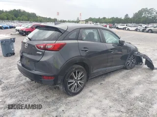 2017 Mazda CX-3 Touring z VIN JM1DKDC7XH0173046, wystawiony jako IAAI lot #42378951 z przebiegiem 223 122 mil mil oraz . Historia ofert i sprzedaży dostępna na DreamBid. Obrazek 4.
