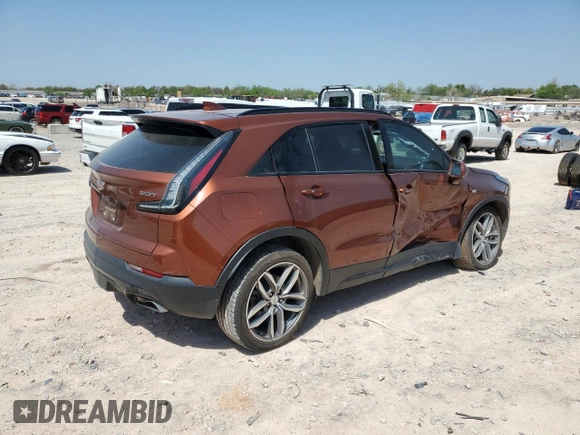 2019 Cadillac XT4 AWD Sport with VIN 1GYFZFR42KF136567, listed as a Copart auction lot 52018445 with 99,944 mi miles and Salvage title. Bid and sale history available at DreamBid. Image 3.