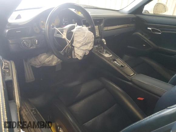 2015 Porsche 911 Turbo z VIN WP0CD2A91FS178328, wystawiony jako Copart lot #57880135 z przebiegiem 34 588 mil mil oraz Szkoda całkowita • Salvage title. Historia ofert i sprzedaży dostępna na DreamBid. Obrazek 8.