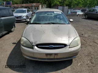 2001 Ford Taurus SE with VIN 1FAFP53U91G108049, listed as a Copart auction lot 55464715 with 85,748 mi miles and Salvage title. Bid and sale history available at DreamBid. Image 5.