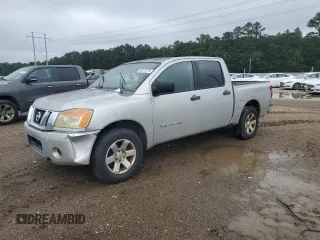 2009 Nissan Titan SE with VIN 1N6BA07D99N308070, listed as a Copart auction lot 58819775 with 228,885 mi miles and Clean title. Bid and sale history available at DreamBid. Image 1.
