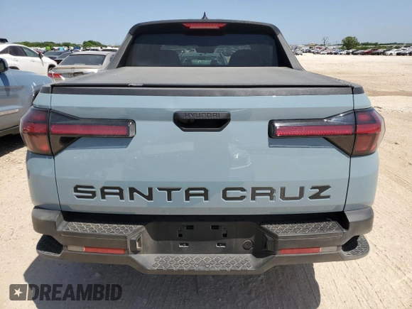 2022 Hyundai Santa Cruz SEL z VIN 5NTJB4AE1NH010080, wystawiony jako Copart lot #53034025 z przebiegiem 19 502 mil mil oraz Czysty tytuł • Clean title. Historia ofert i sprzedaży dostępna na DreamBid. Obrazek 6.