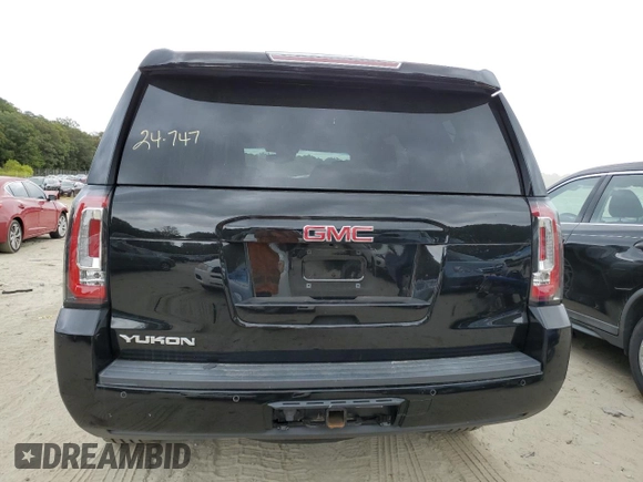2017 GMC Yukon SLT with VIN 1GKS2BKC2HR406007, listed as a Copart auction lot 71702084 with 66,828 mi miles and Salvage Title. Bid and sale history available at carsss.com. Image 6.
