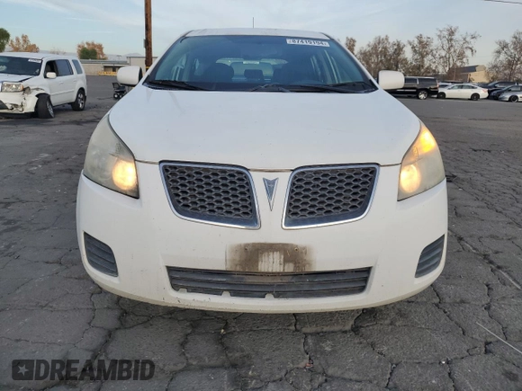2009 Pontiac Vibe w/1SA with VIN 5Y2SL67809Z439030, listed as a Copart auction lot 87419194 with 104,518 mi miles and Salvage Title. Bid and sale history available at carsss.com. Image 5.