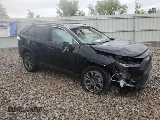 2024 Toyota RAV4 Hybrid XLE Premium z VIN 4T3B6RFVXRU173774, wystawiony jako Copart lot #57258085 z przebiegiem Nie podano mil oraz Szkoda całkowita • Salvage title. Historia ofert i sprzedaży dostępna na DreamBid. Obrazek 4.