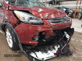 2016 Ford Escape Titanium with VIN 1FMCU9JX6GUB57497, listed as a IAAI auction lot 41375019 with 1 mi miles. Bid and sale history available at carsss.com. Image 6.