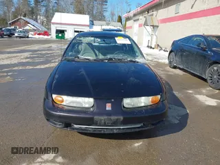 2000 Saturn SL z VIN 1G8ZH5280YZ223608, wystawiony jako IAAI lot #41377752 z przebiegiem 180 857 mil mil oraz . Historia ofert i sprzedaży dostępna na DreamBid. Obrazek 13.