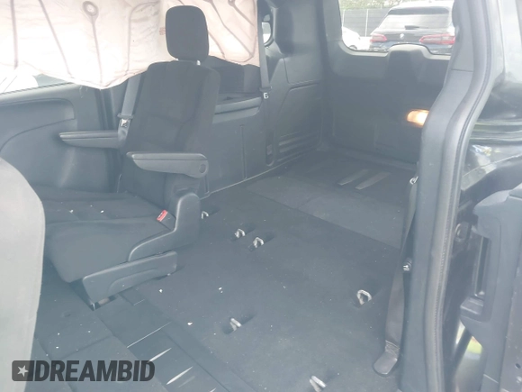 2015 Dodge Grand Caravan American Value with VIN 2C4RDGBGXFR682995, listed as a IAAI auction lot 41994708 with 142,725 mi miles and . Bid and sale history available at DreamBid. Image 8.